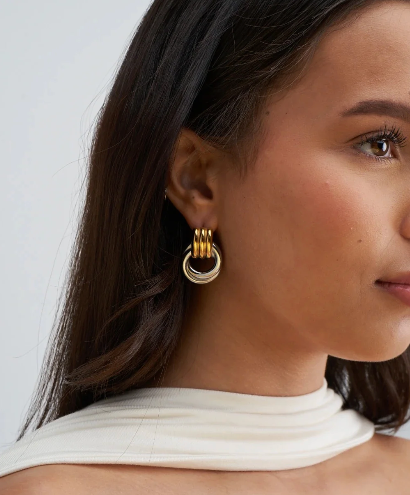 gold earrings for women, gold stud earrings, gold statement earrings, mixed metal earrings, silver earrings for women on model