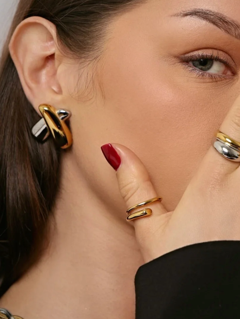 gold earrings for women, gold stud earrings, gold statement earrings, mixed metal earrings, silver earrings for women on model
